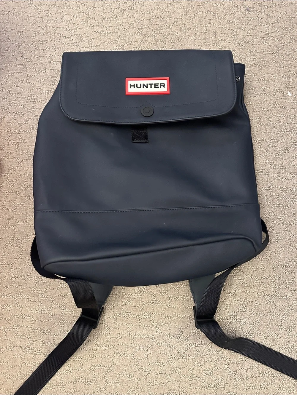 Hunter Navy Blue Waterproof Backpack with Red Logo Accent